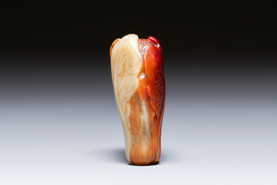 A small Chinese white and russet jade 'cabbage' vase, 19th C.