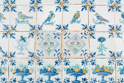 30 polychrome Dutch Delft tiles with birds, flowers and tazzas with fruits, 17th C.