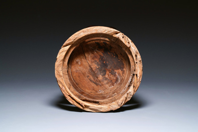 A Chinese wood circular incense stand with mythic animals, 'xiangji', Ming