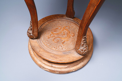 A Chinese wood circular incense stand with mythic animals, 'xiangji', Ming