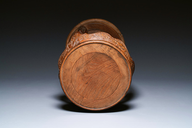 A Chinese wood circular incense stand with mythic animals, 'xiangji', Ming