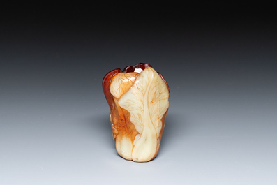 A small Chinese white and russet jade 'cabbage' vase, 19th C.