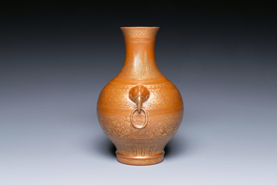 A Chinese brown-glazed 'hu' vase with gilt flower scrolls, Jiaqing mark and of the period