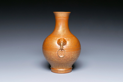 A Chinese brown-glazed 'hu' vase with gilt flower scrolls, Jiaqing mark and of the period