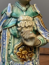 Two South-Chinese polychromed stoneware figures, probably Shiwan, 19th C.