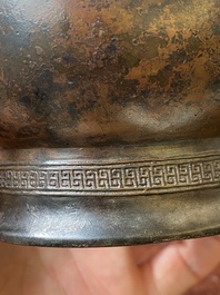 A Chinese inscribed archaic bronze ritual wine vessel, 'zhi', late Shang dynasty