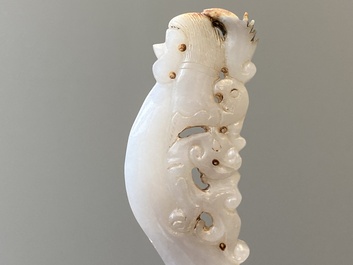 A Chinese white jade hairpin and two jade seal stamps, Qing