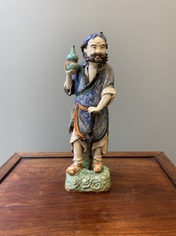 A large Chinese polychrome Shiwan pottery figure of Li Tieguai, 19th C.