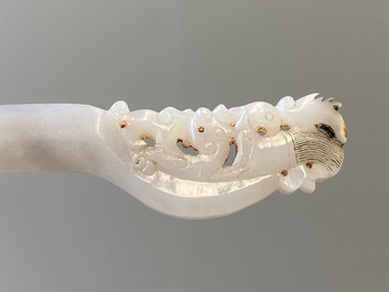 A Chinese white jade hairpin and two jade seal stamps, Qing