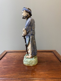 A large Chinese polychrome Shiwan pottery figure of Li Tieguai, 19th C.