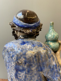 A large Chinese polychrome Shiwan pottery figure of Li Tieguai, 19th C.