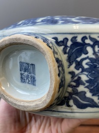 A Chinese blue and white 'bats and peaches' moonflask vase, 'bianhu', Daoguang mark, 19th C.