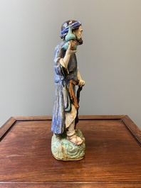 A large Chinese polychrome Shiwan pottery figure of Li Tieguai, 19th C.