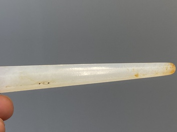 A Chinese white jade hairpin and two jade seal stamps, Qing