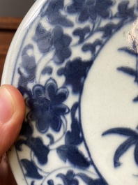 A Chinese blue and white 'bats and peaches' moonflask vase, 'bianhu', Daoguang mark, 19th C.