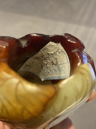 A small Chinese white and russet jade 'cabbage' vase, 19th C.