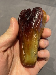 A small Chinese white and russet jade 'cabbage' vase, 19th C.