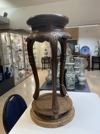 A Chinese wood circular incense stand with mythic animals, 'xiangji', Ming