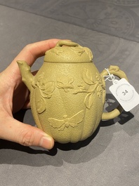 A Chinese Yixing stoneware teapot and cover with squirrels and butterflies, Chen Janyin 陳建寅 seal mark, Kangxi