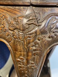 A Chinese wood circular incense stand with mythic animals, 'xiangji', Ming