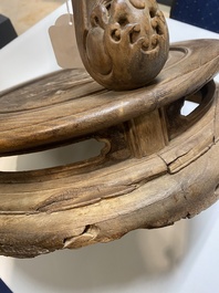 A Chinese wood circular incense stand with mythic animals, 'xiangji', Ming