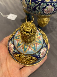 A Chinese 'imperial tribute' blue-ground Canton enamel incense burner and cover, Qianlong mark and of the period