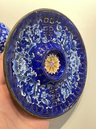 A pair of Chinese Canton enamel trembleuse cups on stands with double 'Shou' design, Qianlong