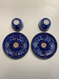A pair of Chinese Canton enamel trembleuse cups on stands with double 'Shou' design, Qianlong