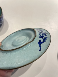 A pair of Chinese Canton enamel trembleuse cups on stands with double 'Shou' design, Qianlong