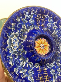A pair of Chinese Canton enamel trembleuse cups on stands with double 'Shou' design, Qianlong