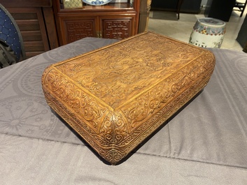 A Chinese rectangular huanghuali wooden box and cover with dragons, 17/18th C.