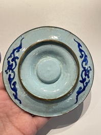 A pair of Chinese Canton enamel trembleuse cups on stands with double 'Shou' design, Qianlong