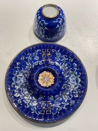 A pair of Chinese Canton enamel trembleuse cups on stands with double 'Shou' design, Qianlong