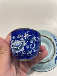 A pair of Chinese Canton enamel trembleuse cups on stands with double 'Shou' design, Qianlong