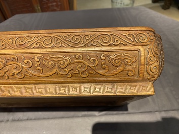 A Chinese rectangular huanghuali wooden box and cover with dragons, 17/18th C.