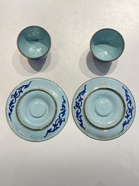A pair of Chinese Canton enamel trembleuse cups on stands with double 'Shou' design, Qianlong