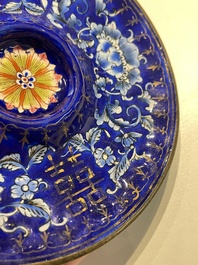 A pair of Chinese Canton enamel trembleuse cups on stands with double 'Shou' design, Qianlong
