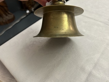 A Flemish brass capstan candlestick, 16th C.