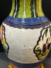 A Chinese famille verte vase and an enamelled Yixing stoneware vase with gilt bronze mounts, 19th C.