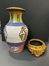 A Chinese famille verte vase and an enamelled Yixing stoneware vase with gilt bronze mounts, 19th C.