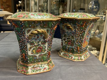 A pair of Chinese Canton famille rose flower holders and covers, 19th C.