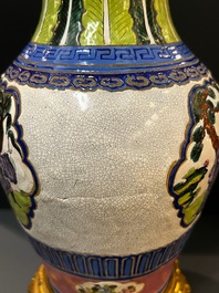 A Chinese famille verte vase and an enamelled Yixing stoneware vase with gilt bronze mounts, 19th C.