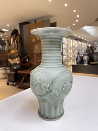 A Chinese Longquan celadon 'peony scroll' vase, Yuan