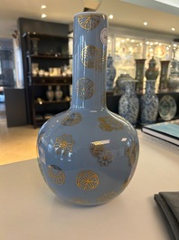 A Chinese lavender blue-ground bottle vase with fruit medallions, Republic