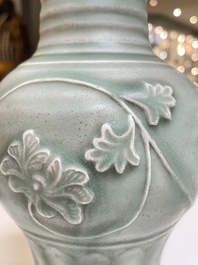 A Chinese Longquan celadon 'peony scroll' vase, Yuan
