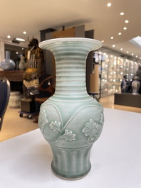 A Chinese Longquan celadon 'peony scroll' vase, Yuan