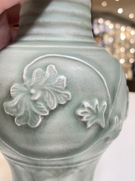 A Chinese Longquan celadon 'peony scroll' vase, Yuan