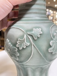 A Chinese Longquan celadon 'peony scroll' vase, Yuan