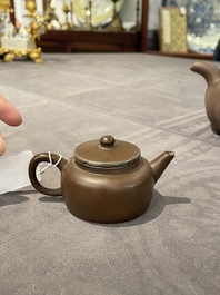 Two Chinese Yixing stoneware teapots and covers with brass mounts, one with Yigong 逸公 seal mark, 19/20th C.