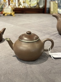 Two Chinese Yixing stoneware teapots and covers with brass mounts, one with Yigong 逸公 seal mark, 19/20th C.